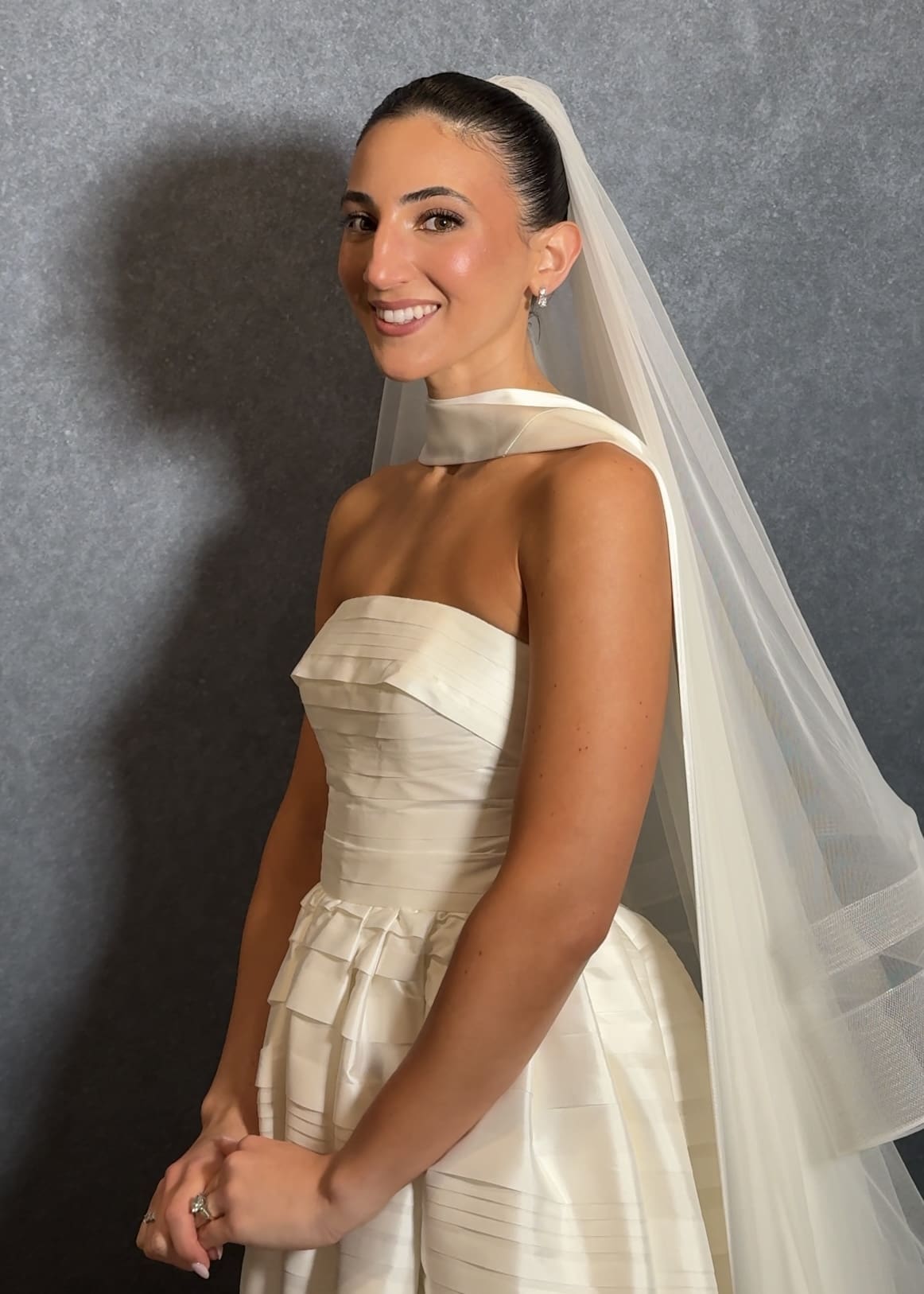 beautiful bride showcases her trial dress and makeup look before her stunning wedding day, showcasing the importance of skin prep before makeup