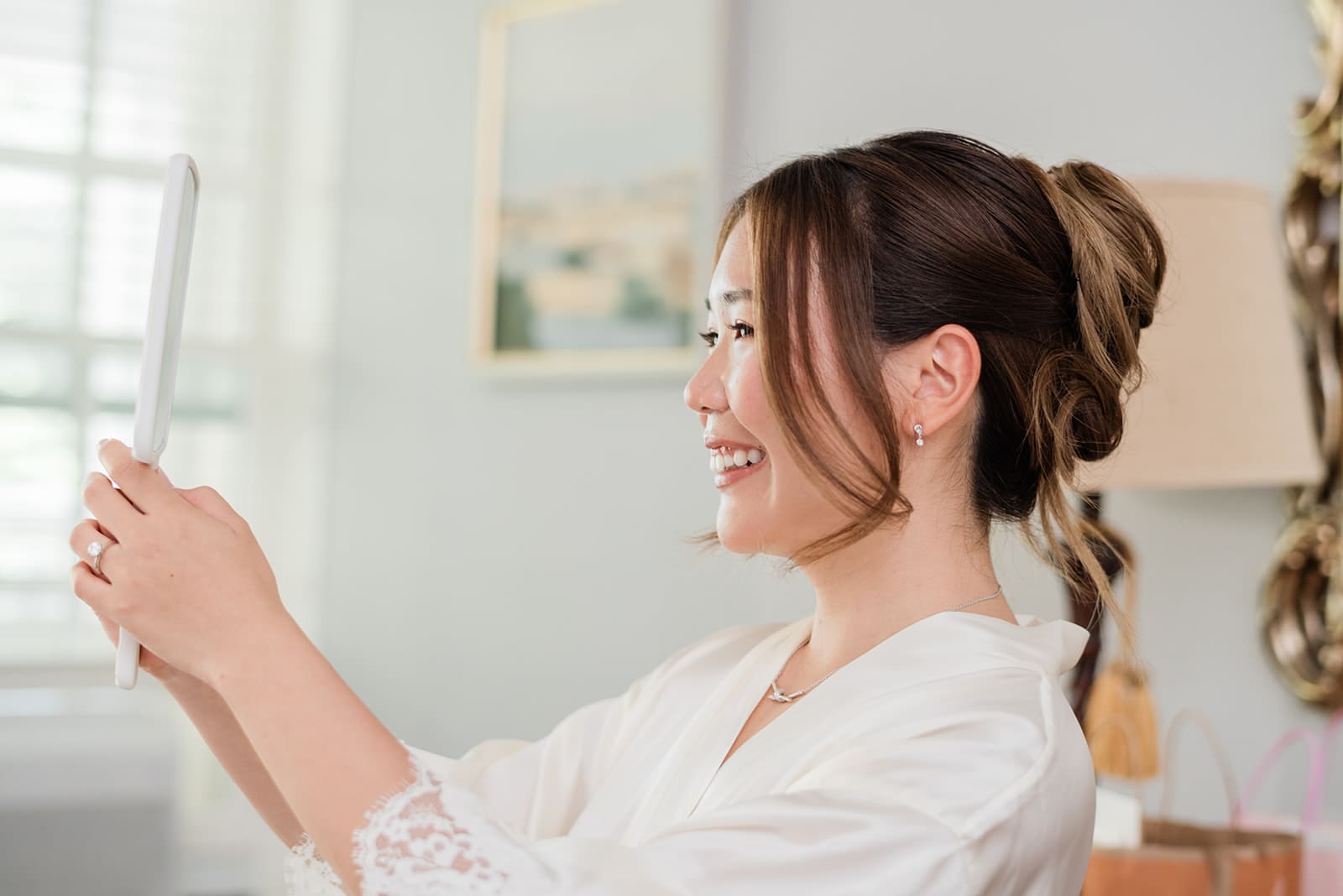 bride gets prepped for her wedding day during her bridal beauty timeline 