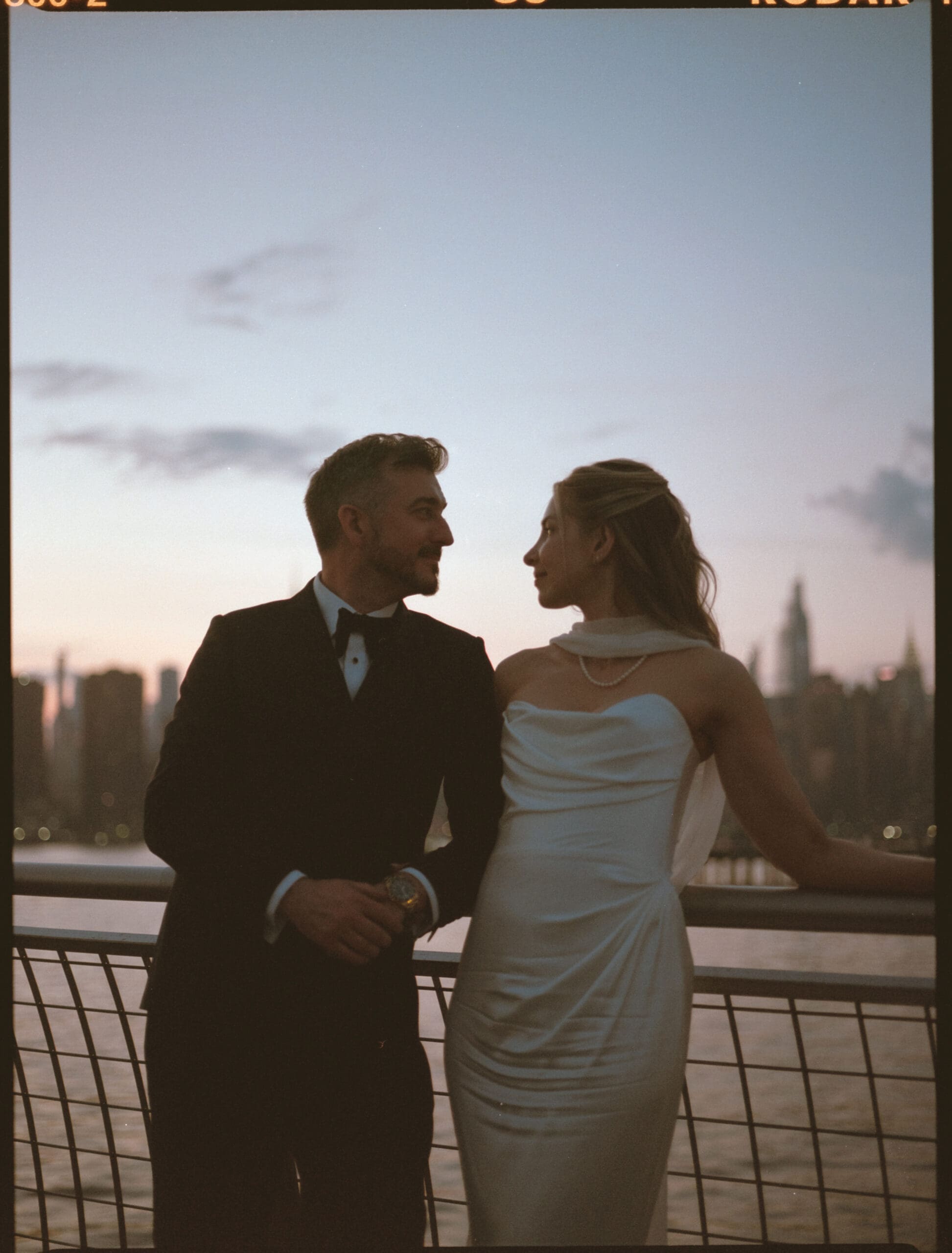 bride and groom pose for a photo after their east coast wedding day